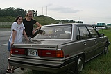 Meghan and Jessica with Kim's car on I75N near 285 after it died on Doug during the rain