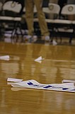 silly Delta paper airplane challenge; people write their contact info on a piece of paper and try to land it on the banner. I wonder if they really throw away all of the planes that miss, though.