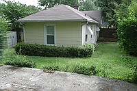 back of the house with mini-deck