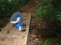 cooking a snack on the footbridge near Bristol Horse Camp