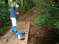 cooking a snack on the footbridge near Bristol Horse Camp