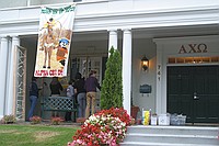 sorority sisters creating homecoming decorations