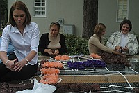 sorority sisters creating homecoming decorations