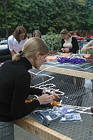 sorority sisters creating homecoming decorations