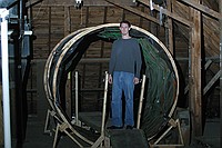 Michael Clements, staff advisor for the Towers Harrison residence halls, stands in front of what will soon be the rotating tunnel as freshmen transform the Towers attic into the Towers Haunted House.