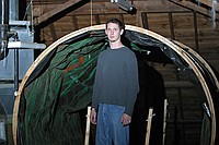 Michael Clements, staff advisor for the Towers Harrison residence halls, stands in front of what will soon be the rotating tunnel as freshmen transform the Towers attic into the Towers Haunted House.