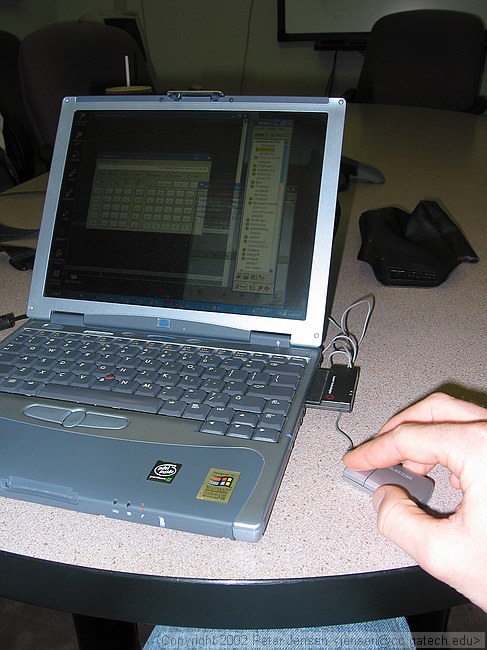 my laptop with Gillian's diminutive mouse