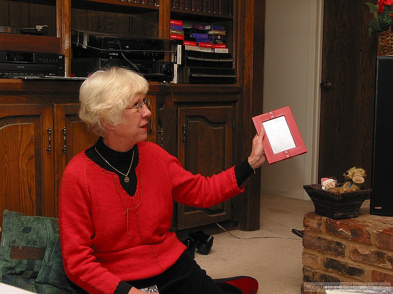 Kathi displays a gift