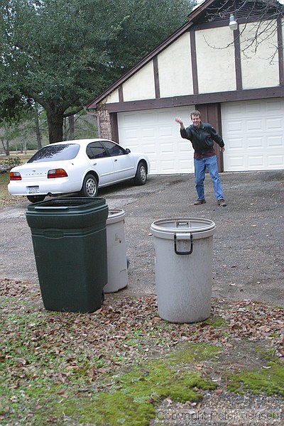 Peter demonstrating lawn bowling at 911 Jeff Davis