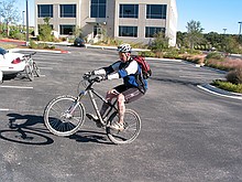 Steve pulling some wheelies and pogo-hops