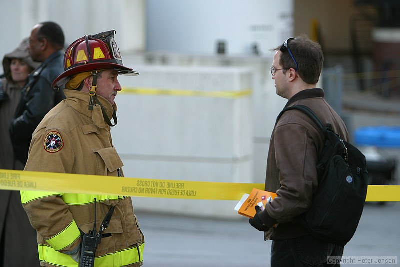 the guy on the right is holding "2000 Emergency Response Guidebook"