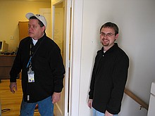 Rod and Thomas, contemplating the installation of a flat panel monitor on the wall of the Aware Home