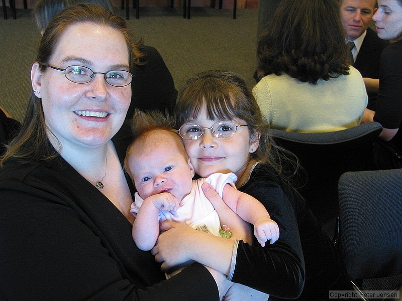 cute family with 7-week-old baby hair