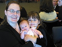 cute family with 7-week-old baby hair