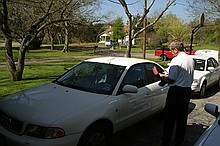 dad cleaning the cars