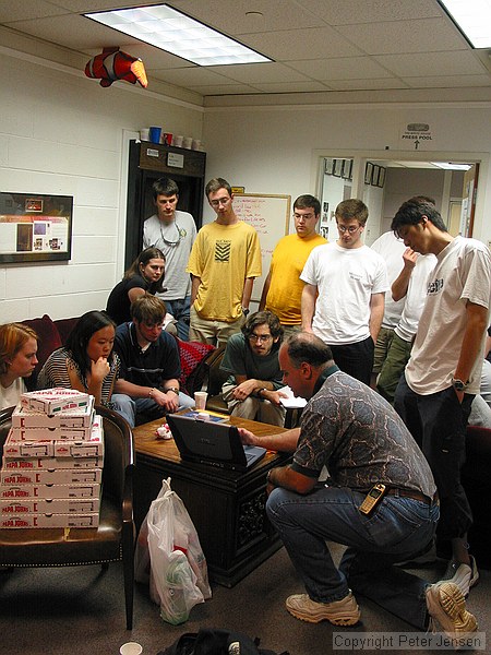 Stanley Leary giving the student publications photography staff a talk about his approach to photojournalism