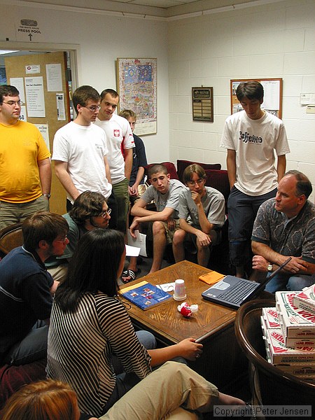 Stanley Leary giving the student publications photography staff a talk about his approach to photojournalism