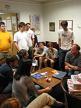 Stanley Leary giving the student publications photography staff a talk about his approach to photojournalism