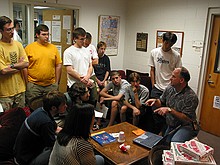 Stanley Leary giving the student publications photography staff a talk about his approach to photojournalism