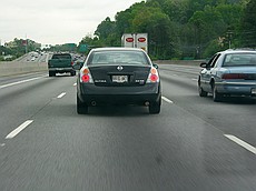 note the right exhaust pipe on this Altima