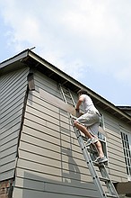 Mike putting up a piece of plywood