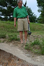 a brown water snake that I never got a head shot of who was lounging in a draining ditch. Est. 3" diameter at the largest part of the snake.