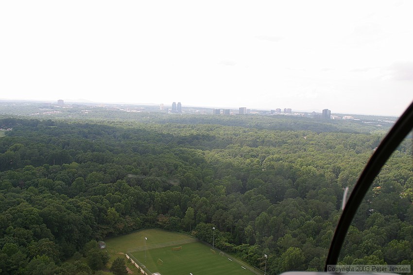 shot through the canopy of a Robinson R-44