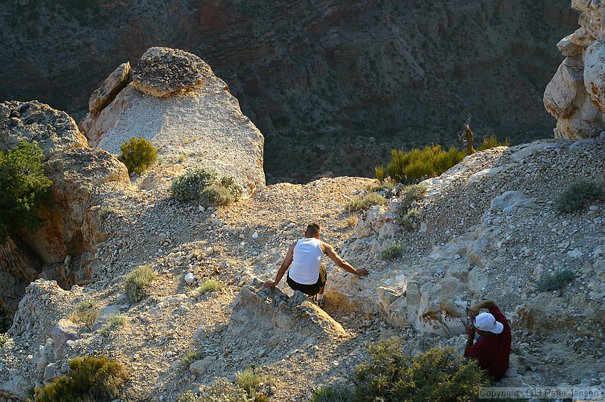 natural selection at work; the path to the left and around to the much larger rock 15' below looked far safer, but luckily judgement prevailed and he stopped there.