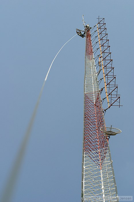 Micky Blackmon of Blackmon Site Services (recommended) preparing to mount the 2m antenna on to the new side arm mount