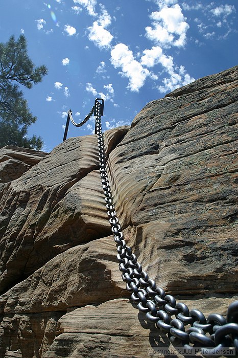 the impact of the chain on the rock is impressive