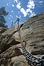 the impact of the chain on the rock is impressive