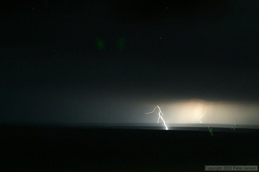 the drive from ABQ to Amarillo was awesome -- major thunderstorms were to our south and northeast, but we never got more than a few drops of rain.  This image is a long exposure taken handheld from a Ford Escape going ~70mph down the road at night.