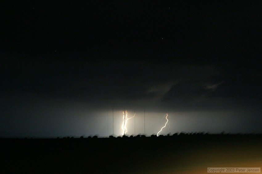 the drive from ABQ to Amarillo was awesome -- major thunderstorms were to our south and northeast, but we never got more than a few drops of rain.  This image is a long exposure taken handheld from a Ford Escape going ~70mph down the road at night.