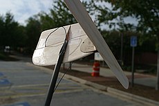 the tail is a work of art, even if I didn't build it so.  The vertical stab has a piece of 1/64 light ply in the lower leading edge to protect against ground strikes and the all-flying elevator linkage is simply amazing.