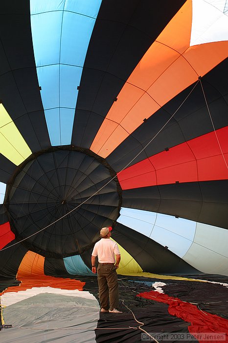 pilot inspecting the inflation