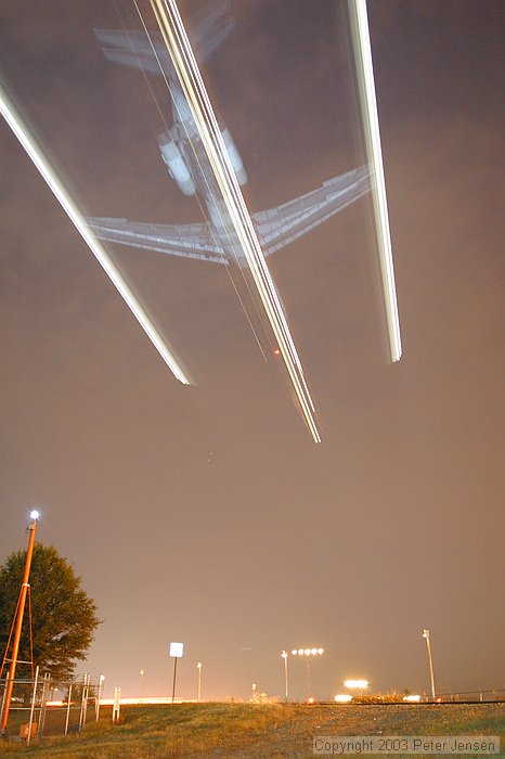 550EX flash (1 or 2) were used to illuminate the bottom of the aircraft as they were coming in to create this effect.  Credit to Charles for the idea.