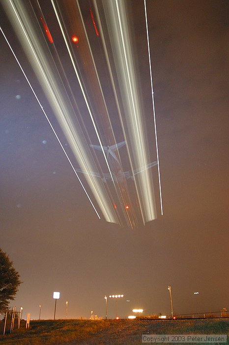 550EX flash (1 or 2) were used to illuminate the bottom of the aircraft as they were coming in to create this effect.  Credit to Charles for the idea.