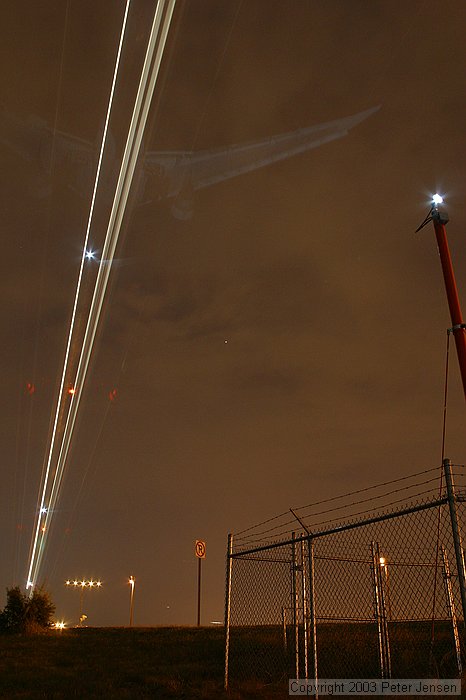 550EX flash (1 or 2) were used to illuminate the bottom of the aircraft as they were coming in to create this effect.  Credit to Charles for the idea.