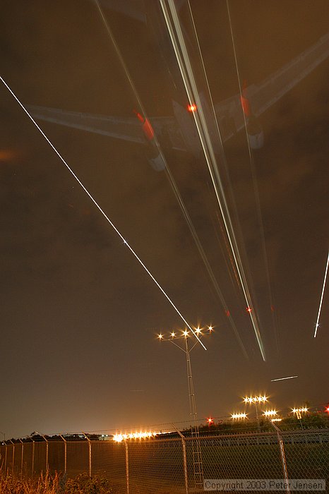 550EX flash (1 or 2) were used to illuminate the bottom of the aircraft as they were coming in to create this effect.  Credit to Charles for the idea.