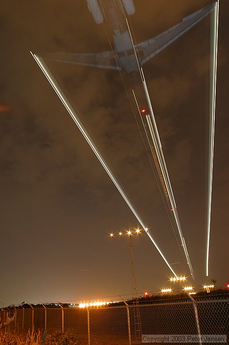 550EX flash (1 or 2) were used to illuminate the bottom of the aircraft as they were coming in to create this effect.  Credit to Charles for the idea.