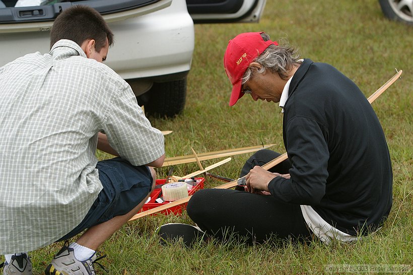 Adam and Breck are putting together one of Breck's new planes