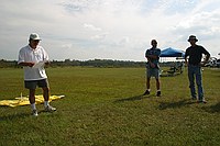 Dick conducts a meeting after the four normal rounds Sunday