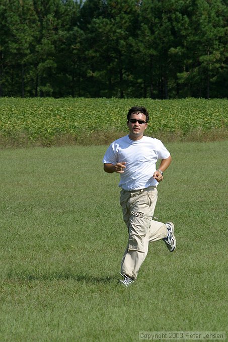 Oleg runs to get his plane before the round starts