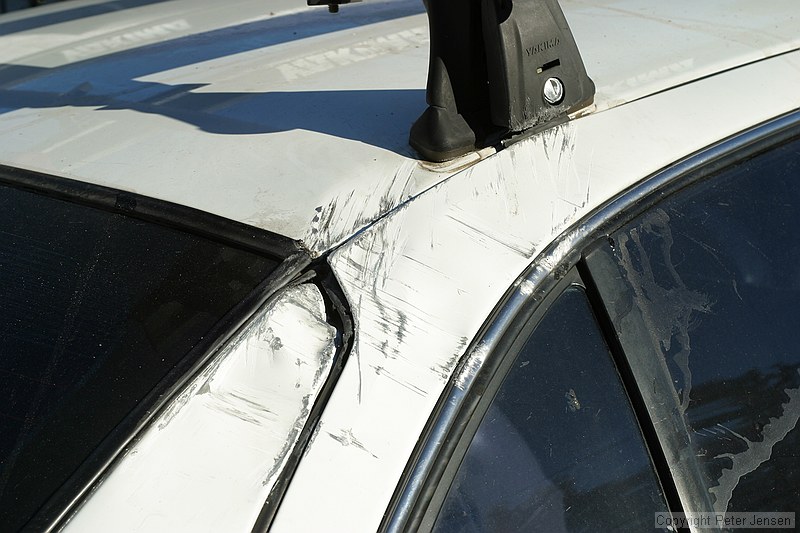 damage to the right rear intersection of roof, door, and panel.  Bike rack was not destroyed, but has it's share of damage.  Seals on door might prove leaky, but am not sure yet.  Right rear wheel hasn't popped yet, but has two large bulges, and there are