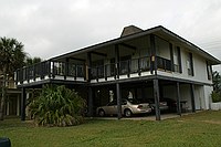 the house (with a trio of Maximas underneath)