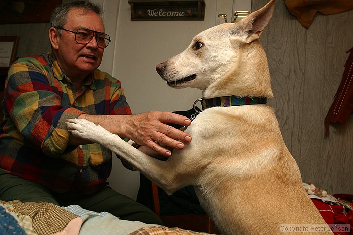 Bill defends himself against the overpowering grasp of Stella