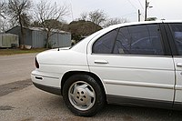 note the paint on the wheel.  We re-did most of that quarter panel and a lot of the intersection with the top of the door