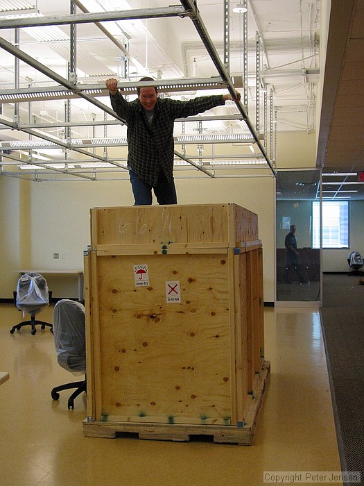 Jay with the new smartboard being installed on the second floor of TSRB