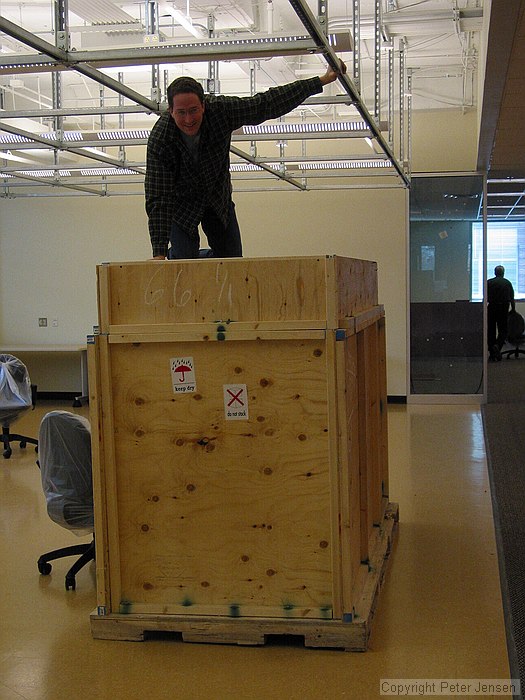 Jay with the new smartboard being installed on the second floor of TSRB