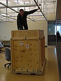 Jay with the new smartboard being installed on the second floor of TSRB